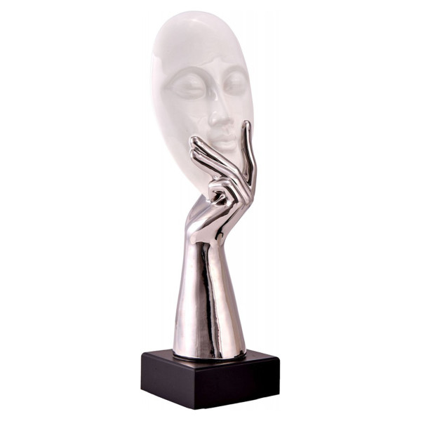 Pensive face sculpture
